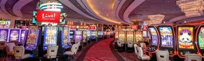 Antarmuka permainan Gates of Olympus di paitohkloto menampilkan grid 6x5 dengan simbol dewa dan multiplier